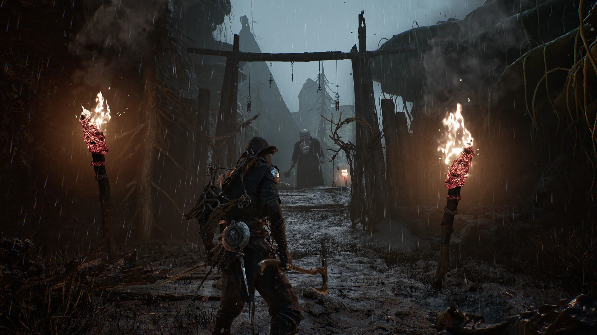 A Shell exploring a torchlit settlement in Mortal Shell II